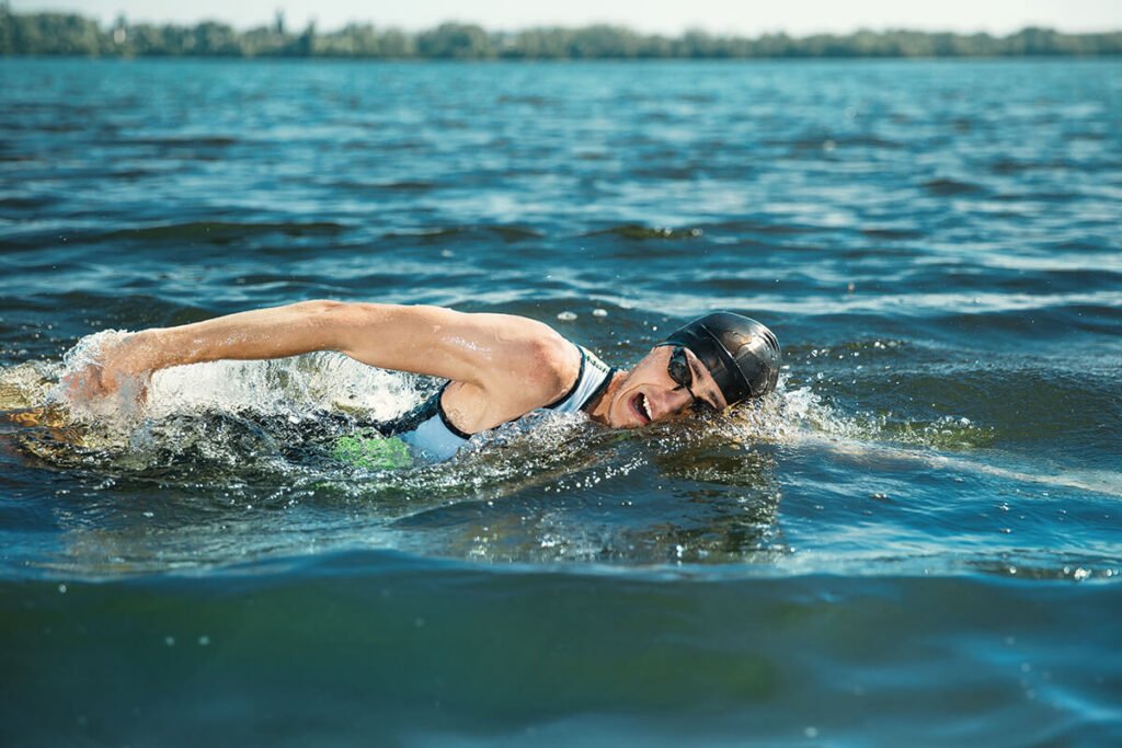 professional triathlete swimming in river 39 s ope